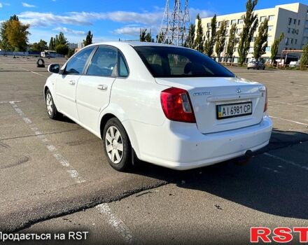 Червоний Шевроле Лачетті, об'ємом двигуна 1.8 л та пробігом 202 тис. км за 3899 $, фото 6 на Automoto.ua