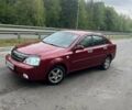 Красный Шевроле Лачетти, объемом двигателя 1.6 л и пробегом 212 тыс. км за 4600 $, фото 4 на Automoto.ua