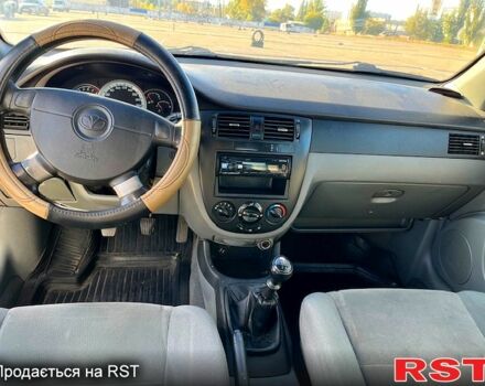 Червоний Шевроле Лачетті, об'ємом двигуна 1.8 л та пробігом 202 тис. км за 3899 $, фото 11 на Automoto.ua