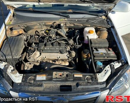 Червоний Шевроле Лачетті, об'ємом двигуна 1.8 л та пробігом 202 тис. км за 3899 $, фото 13 на Automoto.ua