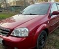 Красный Шевроле Лачетти, объемом двигателя 1.6 л и пробегом 153 тыс. км за 3500 $, фото 1 на Automoto.ua