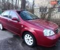Красный Шевроле Лачетти, объемом двигателя 1.8 л и пробегом 174 тыс. км за 4100 $, фото 1 на Automoto.ua