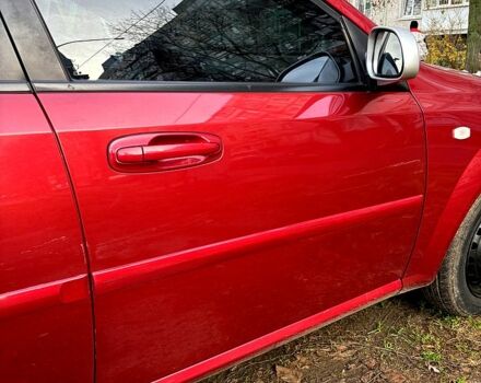 Красный Шевроле Лачетти, объемом двигателя 1.6 л и пробегом 153 тыс. км за 3500 $, фото 7 на Automoto.ua