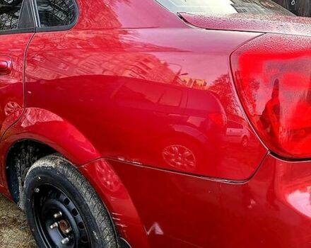 Красный Шевроле Лачетти, объемом двигателя 1.6 л и пробегом 153 тыс. км за 3500 $, фото 2 на Automoto.ua