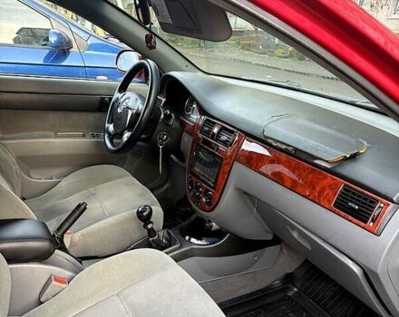 Красный Шевроле Лачетти, объемом двигателя 1.6 л и пробегом 153 тыс. км за 3500 $, фото 9 на Automoto.ua