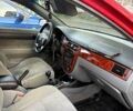 Красный Шевроле Лачетти, объемом двигателя 1.6 л и пробегом 153 тыс. км за 3500 $, фото 9 на Automoto.ua