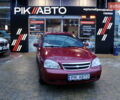 Красный Шевроле Лачетти, объемом двигателя 1.8 л и пробегом 257 тыс. км за 4500 $, фото 1 на Automoto.ua