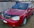 Красный Шевроле Лачетти, объемом двигателя 1.8 л и пробегом 135 тыс. км за 6000 $, фото 1 на Automoto.ua