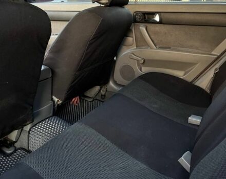 Красный Шевроле Лачетти, объемом двигателя 1.8 л и пробегом 171 тыс. км за 4400 $, фото 11 на Automoto.ua