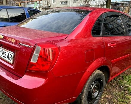Красный Шевроле Лачетти, объемом двигателя 1.6 л и пробегом 153 тыс. км за 3500 $, фото 6 на Automoto.ua