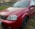 Красный Шевроле Лачетти, объемом двигателя 1.6 л и пробегом 153 тыс. км за 3500 $, фото 2 на Automoto.ua