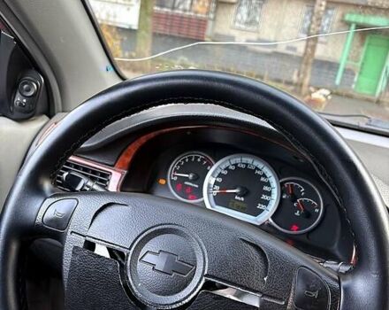 Красный Шевроле Лачетти, объемом двигателя 1.6 л и пробегом 153 тыс. км за 3500 $, фото 11 на Automoto.ua