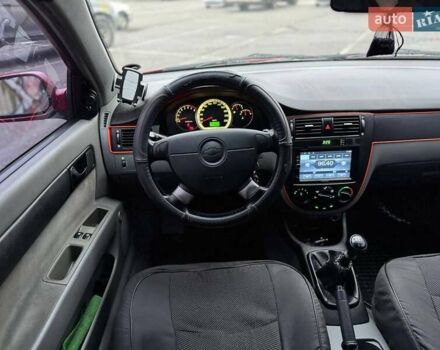 Красный Шевроле Лачетти, объемом двигателя 1.8 л и пробегом 158 тыс. км за 5690 $, фото 13 на Automoto.ua