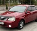 Красный Шевроле Лачетти, объемом двигателя 1.6 л и пробегом 142 тыс. км за 4799 $, фото 1 на Automoto.ua