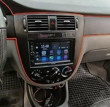 Красный Шевроле Лачетти, объемом двигателя 1.8 л и пробегом 158 тыс. км за 5800 $, фото 25 на Automoto.ua