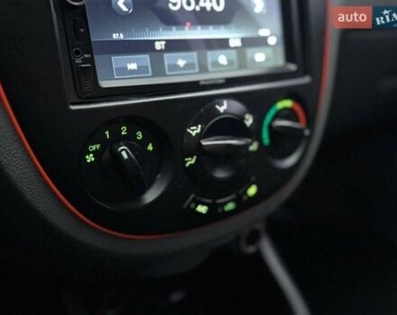 Красный Шевроле Лачетти, объемом двигателя 1.8 л и пробегом 158 тыс. км за 5690 $, фото 21 на Automoto.ua