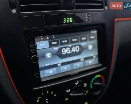 Красный Шевроле Лачетти, объемом двигателя 1.8 л и пробегом 158 тыс. км за 5690 $, фото 20 на Automoto.ua