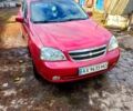 Красный Шевроле Лачетти, объемом двигателя 1.6 л и пробегом 180 тыс. км за 5600 $, фото 5 на Automoto.ua