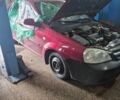 Красный Шевроле Лачетти, объемом двигателя 1.8 л и пробегом 390 тыс. км за 2100 $, фото 1 на Automoto.ua