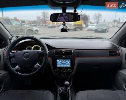 Красный Шевроле Лачетти, объемом двигателя 1.8 л и пробегом 158 тыс. км за 5390 $, фото 12 на Automoto.ua