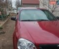 Красный Шевроле Лачетти, объемом двигателя 1.6 л и пробегом 235 тыс. км за 3100 $, фото 2 на Automoto.ua