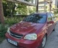 Красный Шевроле Лачетти, объемом двигателя 1.8 л и пробегом 277 тыс. км за 3509 $, фото 1 на Automoto.ua