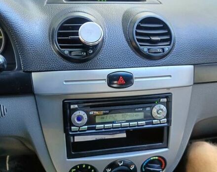 Красный Шевроле Лачетти, объемом двигателя 1.6 л и пробегом 220 тыс. км за 4300 $, фото 12 на Automoto.ua