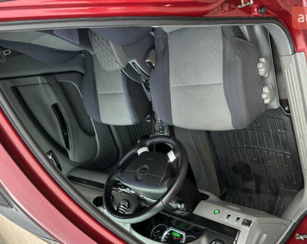 Червоний Шевроле Лачетті, об'ємом двигуна 1.8 л та пробігом 280 тис. км за 5850 $, фото 8 на Automoto.ua
