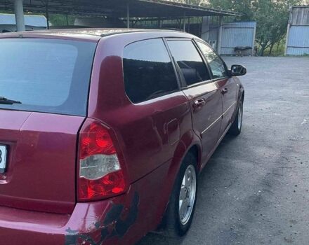 Красный Шевроле Лачетти, объемом двигателя 2.5 л и пробегом 270 тыс. км за 2450 $, фото 6 на Automoto.ua