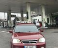 Красный Шевроле Лачетти, объемом двигателя 1.8 л и пробегом 251 тыс. км за 3999 $, фото 1 на Automoto.ua