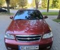 Красный Шевроле Лачетти, объемом двигателя 1.6 л и пробегом 220 тыс. км за 4300 $, фото 9 на Automoto.ua