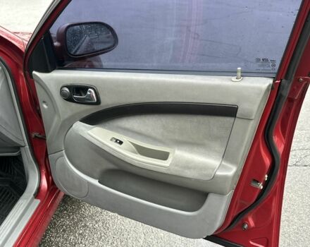 Красный Шевроле Лачетти, объемом двигателя 1.8 л и пробегом 251 тыс. км за 3999 $, фото 17 на Automoto.ua