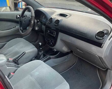 Красный Шевроле Лачетти, объемом двигателя 2.5 л и пробегом 270 тыс. км за 2450 $, фото 1 на Automoto.ua