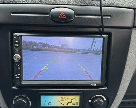 Червоний Шевроле Лачетті, об'ємом двигуна 1.8 л та пробігом 280 тис. км за 5850 $, фото 13 на Automoto.ua