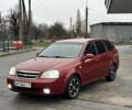 Красный Шевроле Лачетти, объемом двигателя 1.8 л и пробегом 251 тыс. км за 3999 $, фото 5 на Automoto.ua