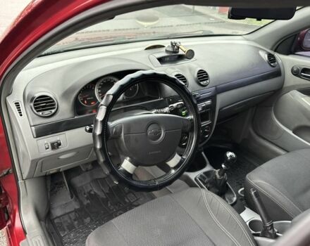 Красный Шевроле Лачетти, объемом двигателя 1.8 л и пробегом 251 тыс. км за 3999 $, фото 21 на Automoto.ua