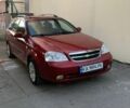 Красный Шевроле Лачетти, объемом двигателя 1.8 л и пробегом 240 тыс. км за 3300 $, фото 1 на Automoto.ua