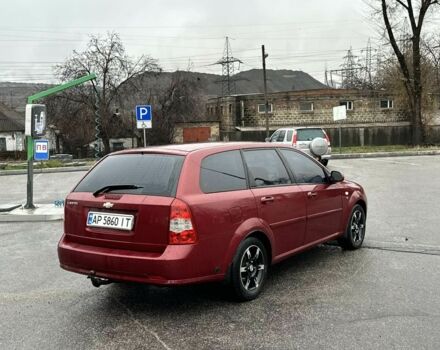 Красный Шевроле Лачетти, объемом двигателя 1.8 л и пробегом 251 тыс. км за 3999 $, фото 14 на Automoto.ua