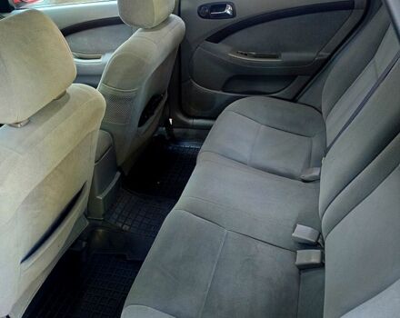 Красный Шевроле Лачетти, объемом двигателя 1.6 л и пробегом 220 тыс. км за 4200 $, фото 2 на Automoto.ua