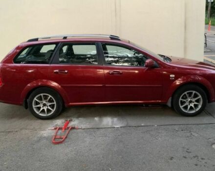 Красный Шевроле Лачетти, объемом двигателя 1.8 л и пробегом 240 тыс. км за 3300 $, фото 2 на Automoto.ua