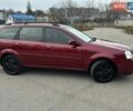 Красный Шевроле Лачетти, объемом двигателя 1.8 л и пробегом 280 тыс. км за 4350 $, фото 1 на Automoto.ua
