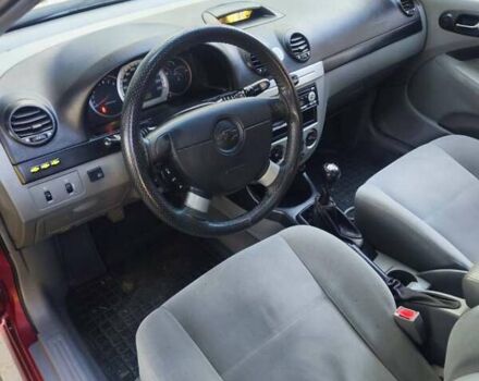 Красный Шевроле Лачетти, объемом двигателя 1.6 л и пробегом 220 тыс. км за 4300 $, фото 5 на Automoto.ua