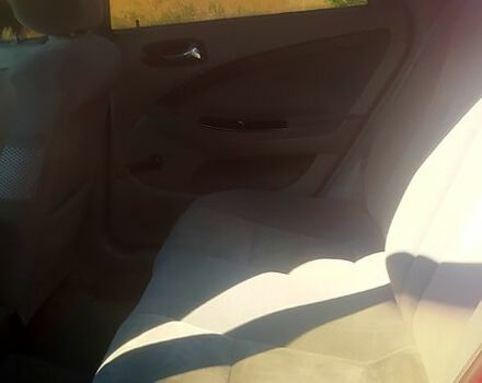 Красный Шевроле Лачетти, объемом двигателя 1.8 л и пробегом 271 тыс. км за 4250 $, фото 3 на Automoto.ua