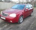 Красный Шевроле Лачетти, объемом двигателя 1.8 л и пробегом 300 тыс. км за 2623 $, фото 1 на Automoto.ua