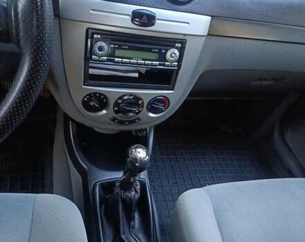 Красный Шевроле Лачетти, объемом двигателя 1.6 л и пробегом 220 тыс. км за 4300 $, фото 29 на Automoto.ua