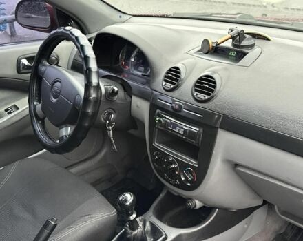 Красный Шевроле Лачетти, объемом двигателя 1.8 л и пробегом 251 тыс. км за 3999 $, фото 19 на Automoto.ua