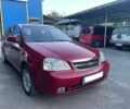 Красный Шевроле Лачетти, объемом двигателя 2.5 л и пробегом 270 тыс. км за 2450 $, фото 1 на Automoto.ua