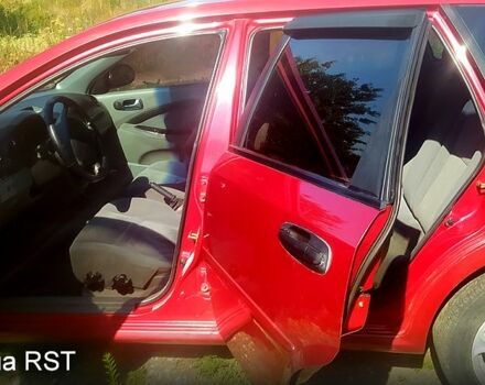 Красный Шевроле Лачетти, объемом двигателя 1.8 л и пробегом 271 тыс. км за 4250 $, фото 2 на Automoto.ua