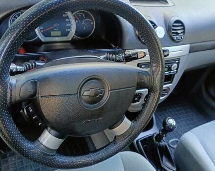 Красный Шевроле Лачетти, объемом двигателя 1.6 л и пробегом 220 тыс. км за 4300 $, фото 13 на Automoto.ua