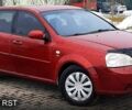 Красный Шевроле Лачетти, объемом двигателя 1.8 л и пробегом 219 тыс. км за 3600 $, фото 1 на Automoto.ua